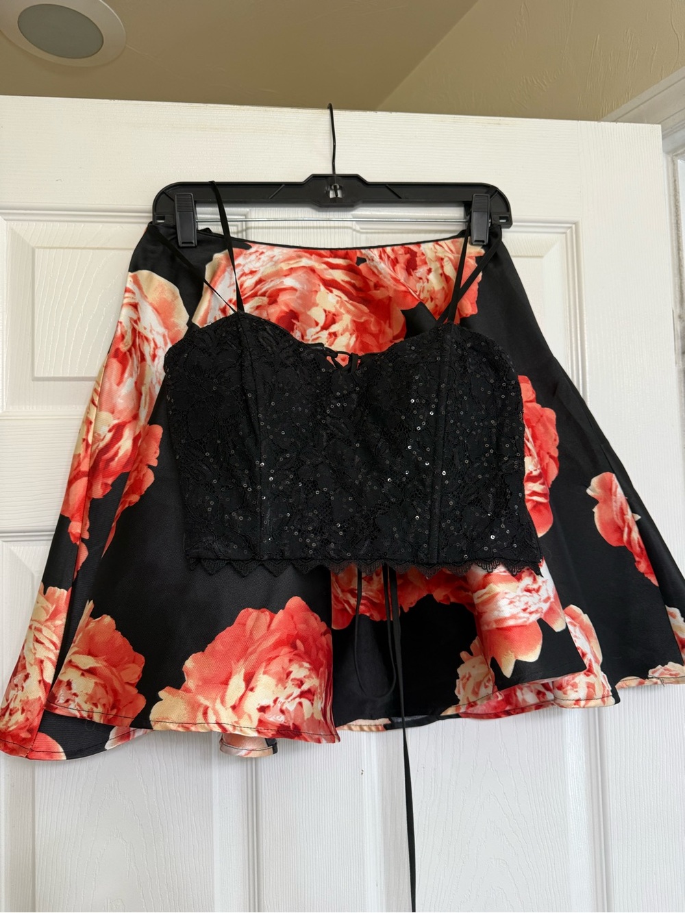 City Triangles Black Top with Coral Floral Accent